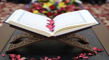 حكم طباعة آية من القرآن الكريم على العملات