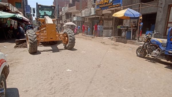 بالصور..حملة لرفع الاشغالات وتجريد الطريق الرئيسي لقرية المنوات بالجيزة