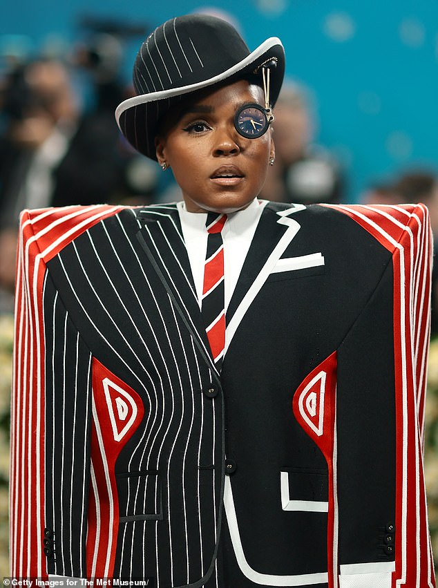 Janelle Monae chose a very structured suit that later revealed a more tailored look beneath