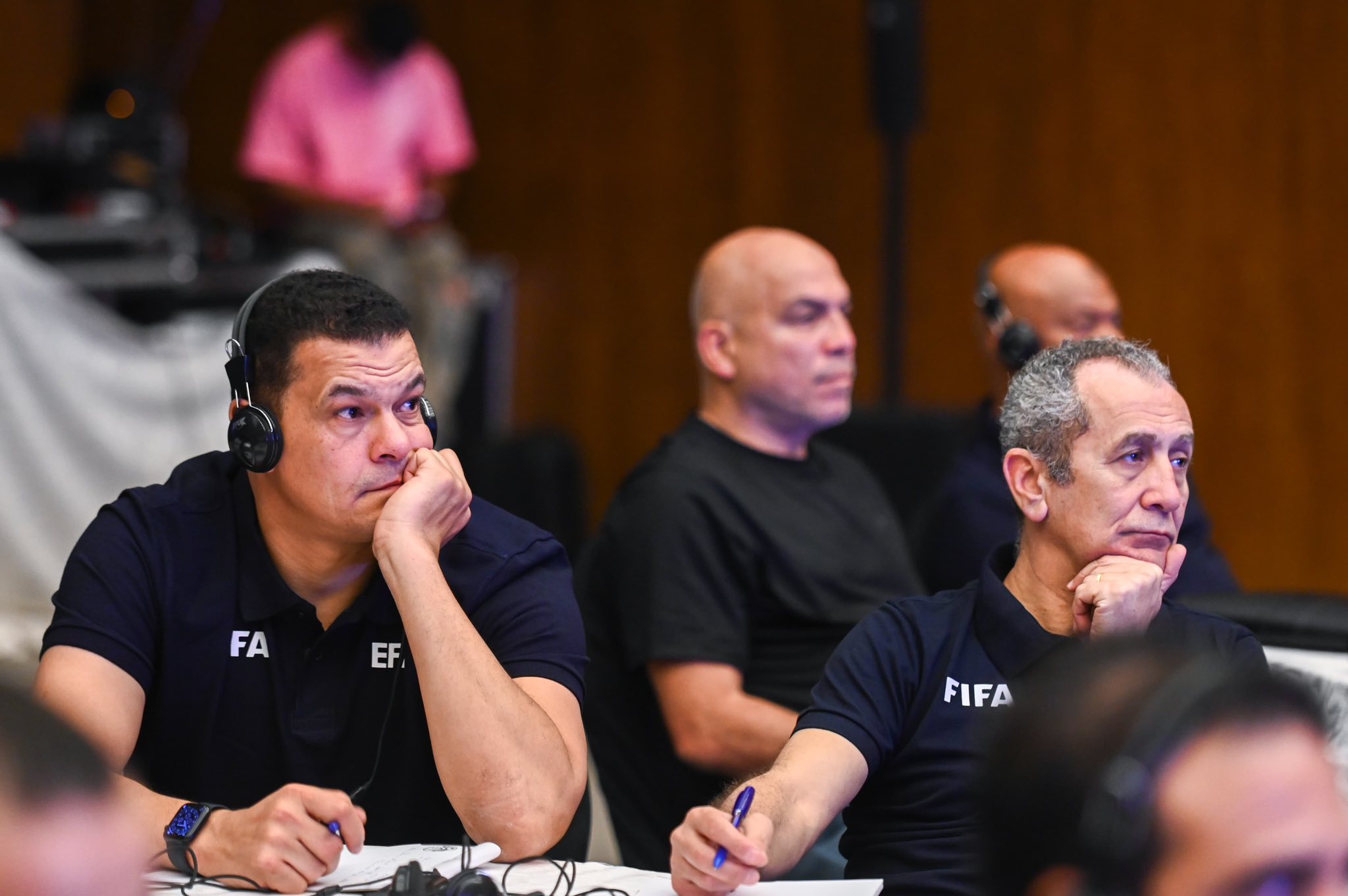 May be an image of 5 people and text that says 'FA EF. FIFA'