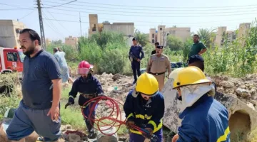 الدفاع المدني ينقذ عاملاً سقط عليه سقف منزل في الرمادي (صور)