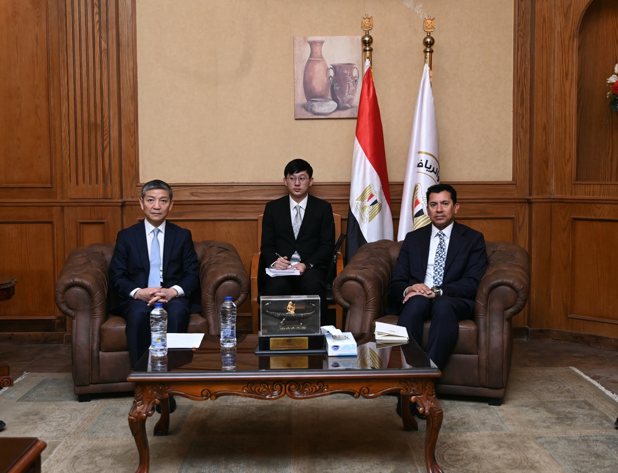 May be an image of 3 people, the Oval Office and text
