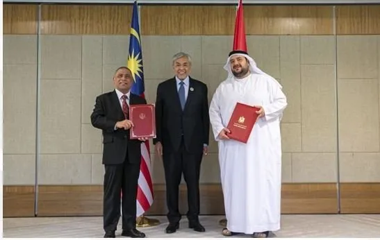 الإمارات وماليزيا توقعان اتفاقية لتعزيز الأمن الغذائي وتحسين البنية التحتية. الإمارات وماليزيا توقعان اتفاقية لتعزيز الأمن الغذائي وتحسين البنية التحتية.
