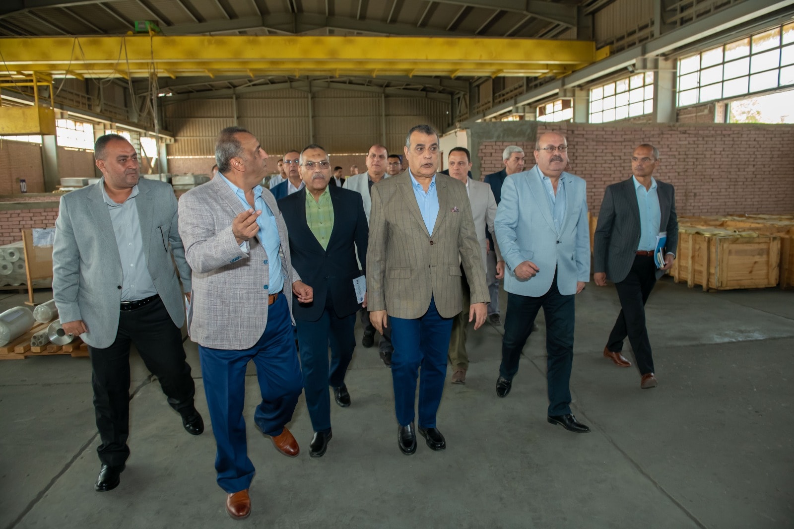 May be an image of 7 people and suit