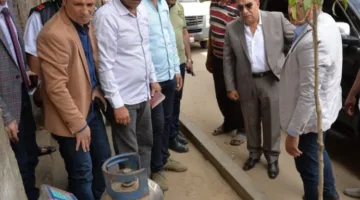 محافظ الدقهلية يوجه بتأمين جرار يت Dump debris from construction and demolition on the main road.
