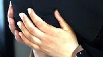 اعتقال أم طعنت ابنها في العمرانية (تفاصيل)