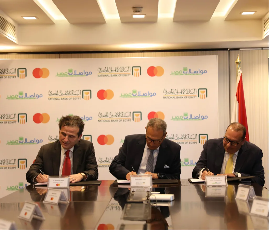 البنك الأهلي وماستركارد يبرمان اتفاقية مع مواصلات مصر لتحويل مدفوعات النقل إلى النظام الرقمي البنك الأهلي وماستركارد يبرمان اتفاقية مع مواصلات مصر لتحويل مدفوعات النقل إلى النظام الرقمي