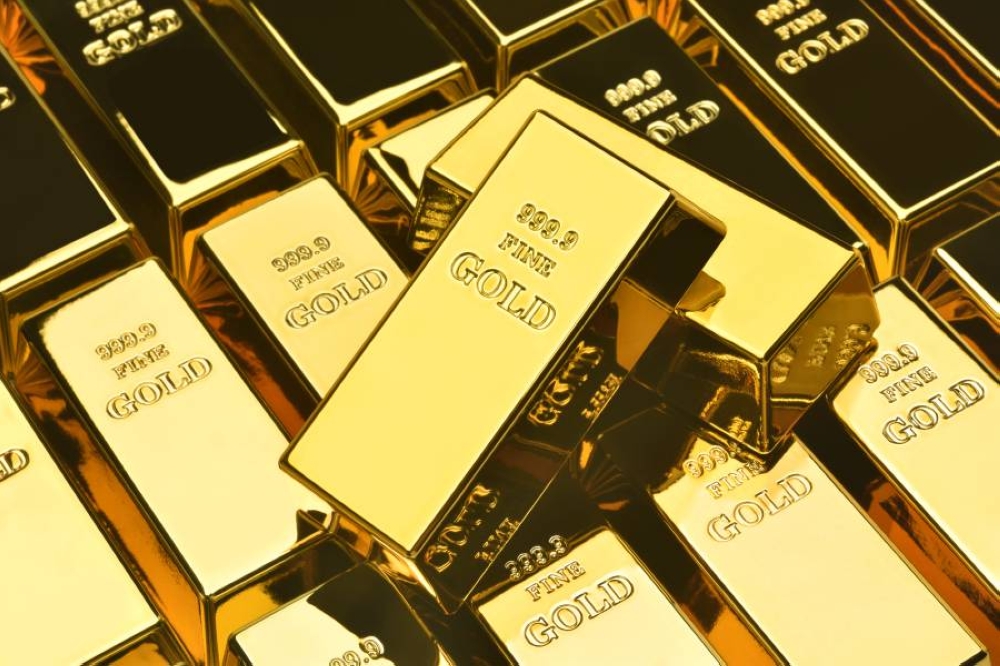 الذهب يرتفع بدعم من تراجع الدولار وترقّب قرار الاحتياطي الفيدرالي