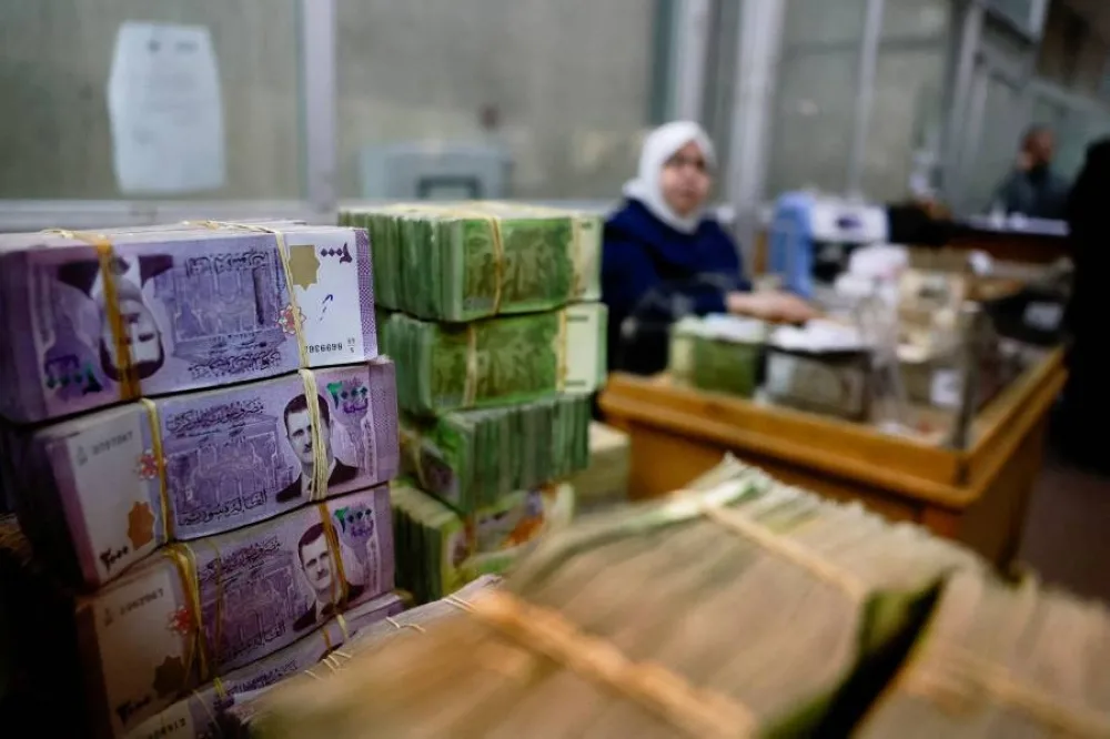 الليرة السورية ترتفع مقابل الدولار اليوم الأربعاء بعد إعلان رفع العقوبات عن سوريا
