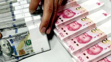 انخفاض قيمة اليوان الصيني مقابل الدولار
