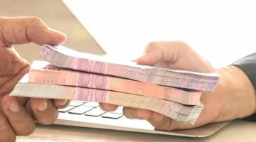 تفاصيل حسابات البنك الأهلي بعد انخفاض الفائدة 1%.. و«الأهلي بلس» بالدولار