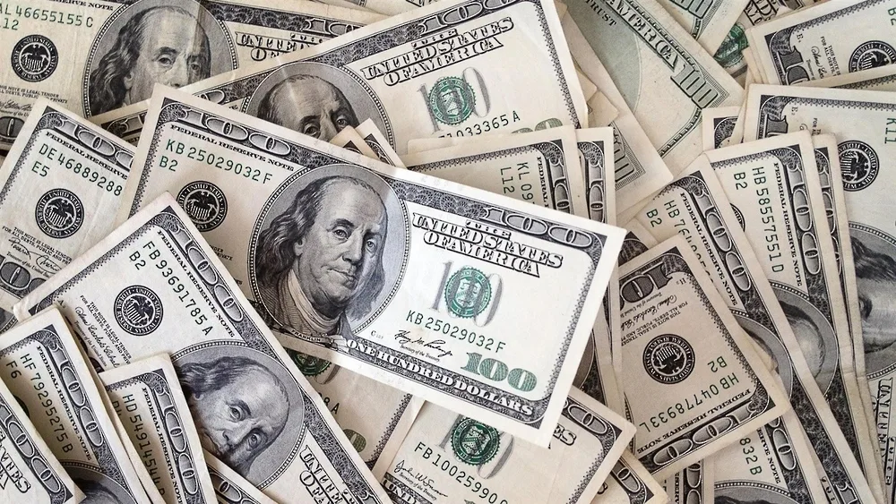 ثبات الدولار مع تراجع التوترات التجارية العالمية