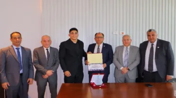 رئيس جامعة حلوان الأهلية يكرم بطل إفريقيا في المصارعة الحرة