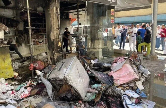 رئيس حى شرق بورسعيد تتابع السيطرة على حريق بأحد المحلات التجارية