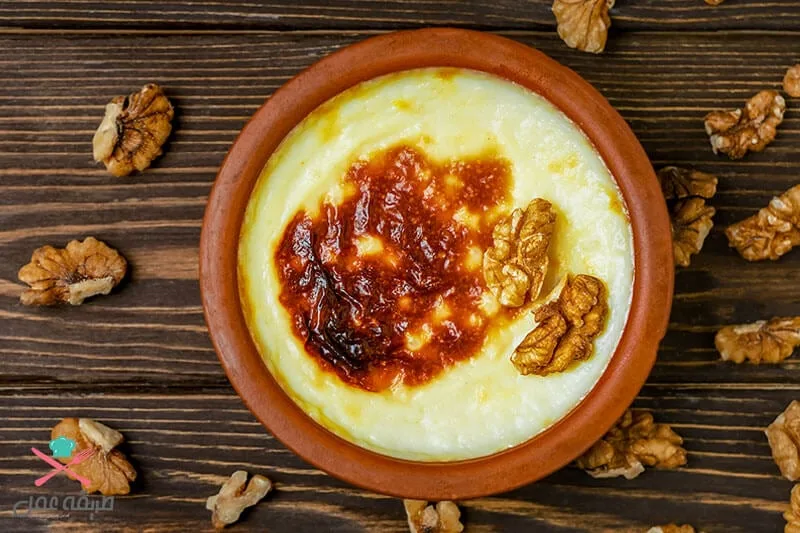 طريقة عمل أرز باللبن بالبرتقال بوصفة احترافية.. اتبعي هذه الخطوة عند التسوية