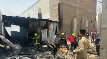 نيران تشتعل في مطعم داخل المدينة المائية في النجف (صور)