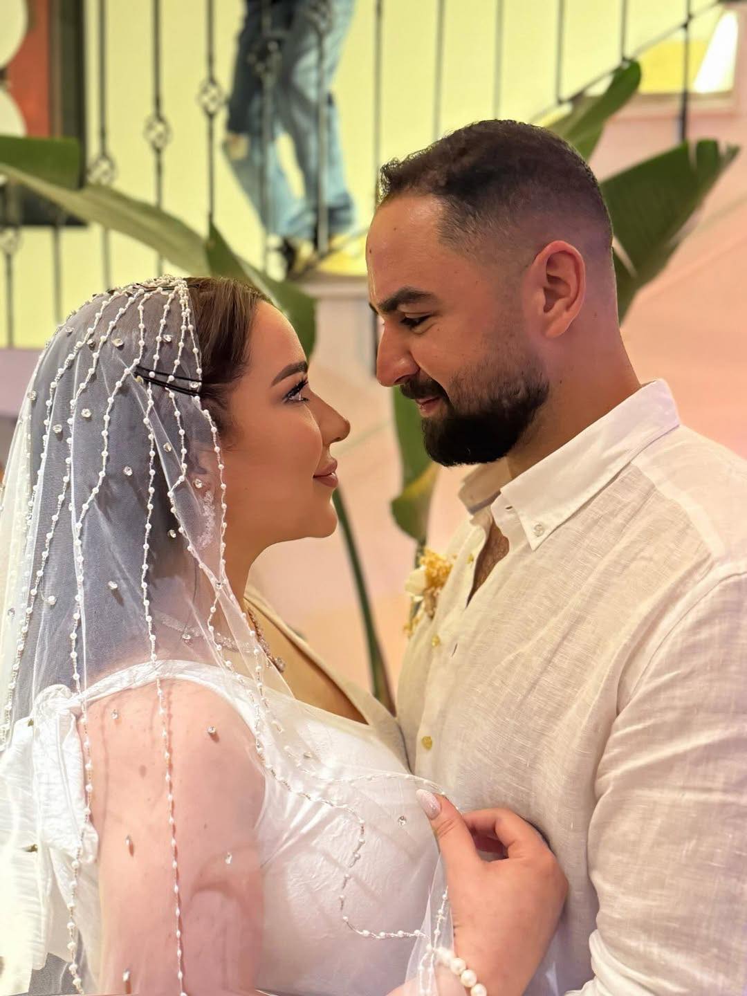 May be an image of 2 people and wedding