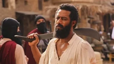 بدقن كثيفة.. محمد رمضان يستعرض كواليس تصوير فيلم “أسد” قبل طرحه قريباً بدقن كثيفة.. محمد رمضان يستعرض كواليس تصوير فيلم “أسد” قبل طرحه قريباً