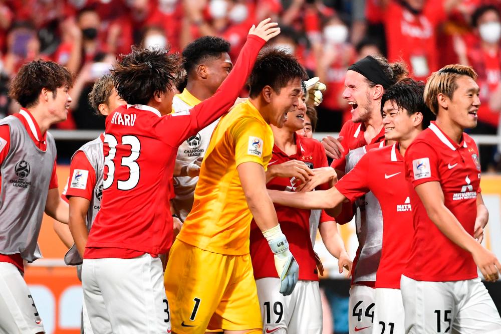Japan's Urawa win penalty thriller to reach AFC final