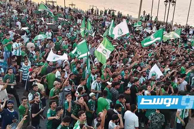 حشود جماهيرية ترحب بنجوم الأهلي طرابلس، أبطال إفريقيا في كرة السلة حشود جماهيرية ترحب بنجوم الأهلي طرابلس، أبطال إفريقيا في كرة السلة