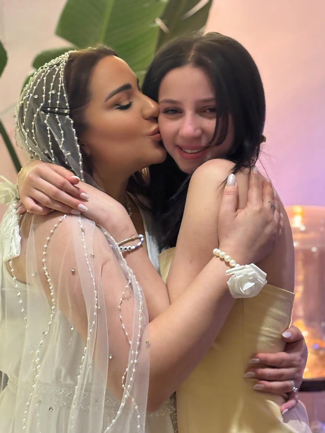 May be an image of 1 person and wedding
