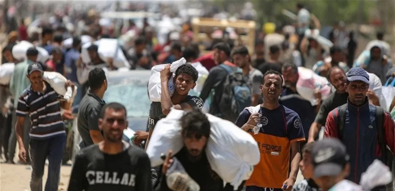 استشهاد عدد من الفلسطينيين خلال انتظارهم للمساعدات الغذائية في قطاع غزة استشهاد عدد من الفلسطينيين خلال انتظارهم للمساعدات الغذائية في قطاع غزة