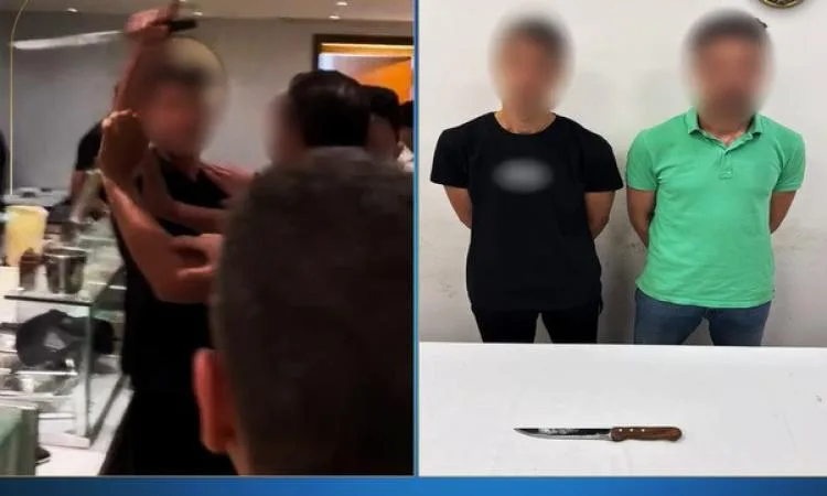 تسليط الضوء على تفاصيل فيديو لعامل في مطعم يهدد الزبائن بسكين داخل المنشأة. تسليط الضوء على تفاصيل فيديو لعامل في مطعم يهدد الزبائن بسكين داخل المنشأة.