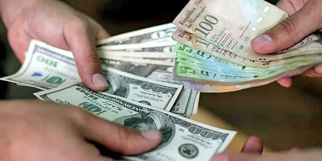 حملة شاملة في فنزويلا لمكافحة تداول الدولار في السوق السوداء حملة شاملة في فنزويلا لمكافحة تداول الدولار في السوق السوداء