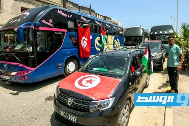 منظمو “قافلة الصمود”: السلطات في شرق ليبيا أرغمتنا على التوقف عند مدخل سرت منظمو “قافلة الصمود”: السلطات في شرق ليبيا أرغمتنا على التوقف عند مدخل سرت