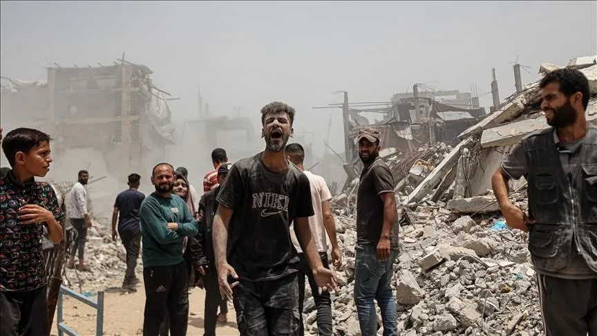 ناجي من مجزرة المجوّعين: forced us to crawl amid heavy Israeli gunfire. ناجي من مجزرة المجوّعين: forced us to crawl amid heavy Israeli gunfire.