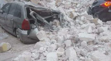 عقار في مدينة المنيا ينهار ويعطب سيارتين تحته